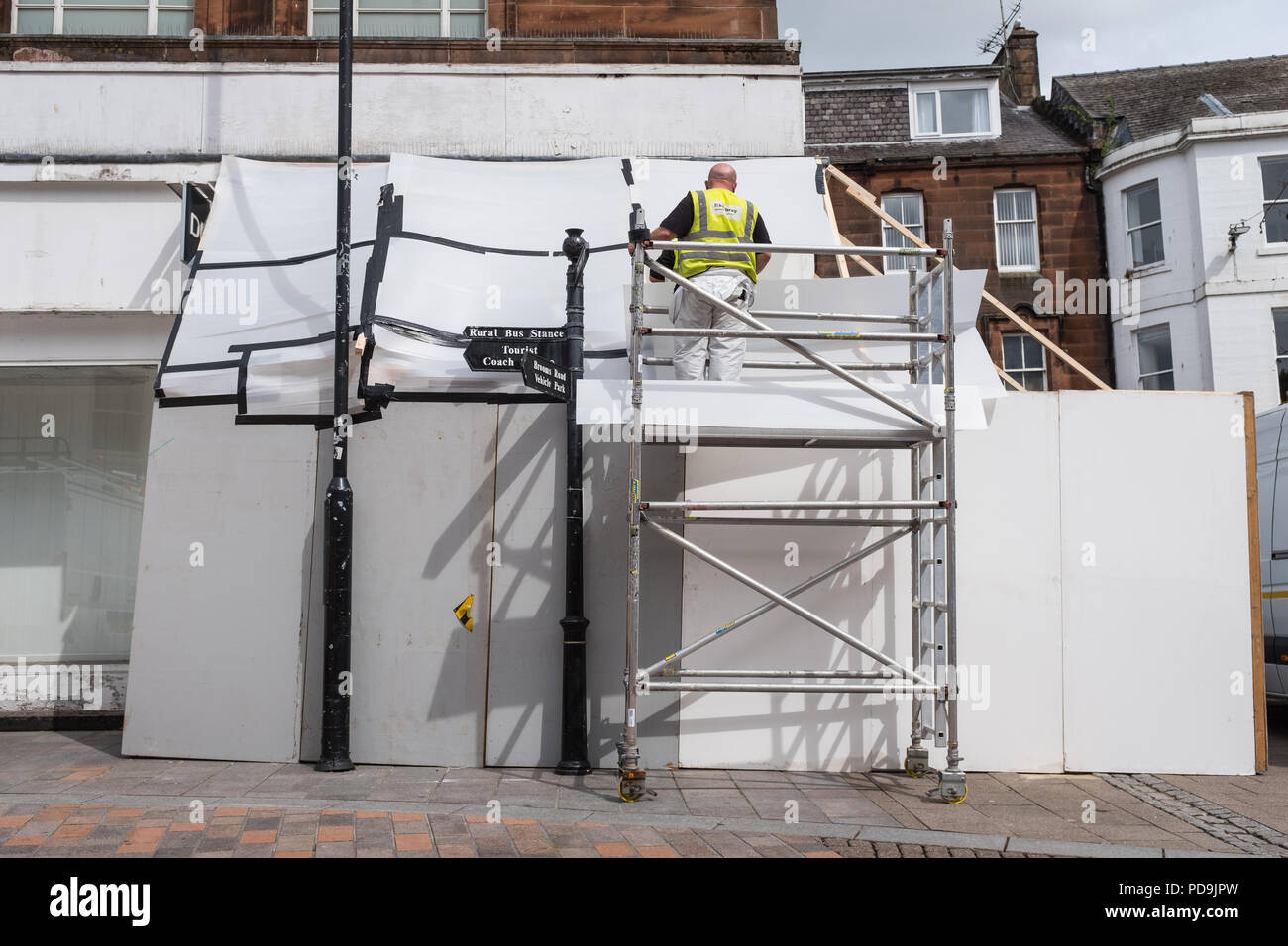 Repair work begins on the fire damaged Dorothy Perkins shop in Dumfries, Scotland Stock Photo