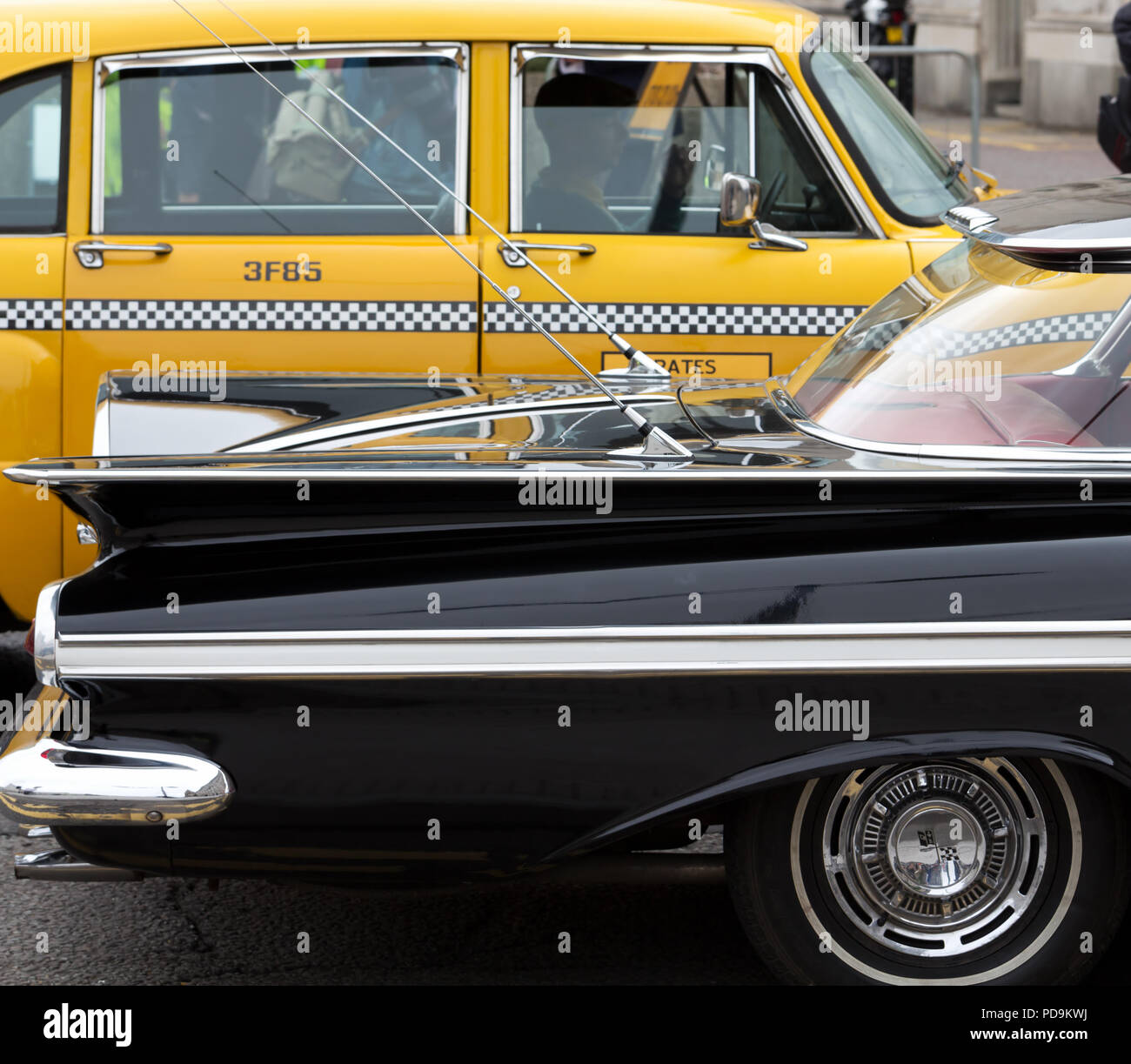 Vintage Washington DC yellow taxi cab photographed in Liverpool UK whilst being filmed as part of a major TV series. Stock Photo