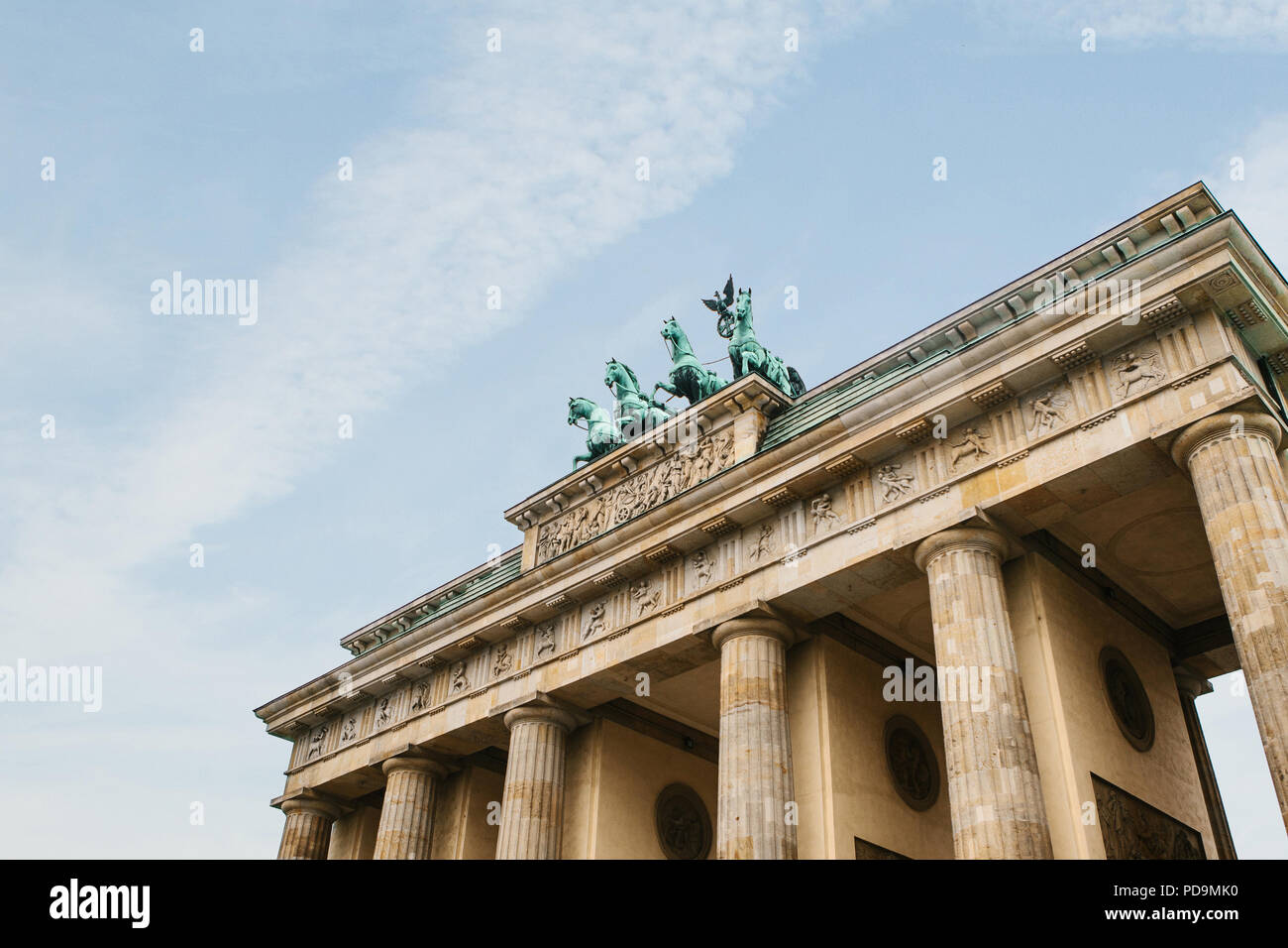 Brandenburg gate in Berlin, Germany. Architectural monument in historic center of Berlin. Symbol and monument of architecture Stock Photo