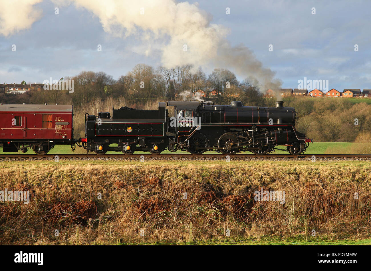 76084 heads past Burrs with a parcels train on the ELR  5.2.14 Stock Photo