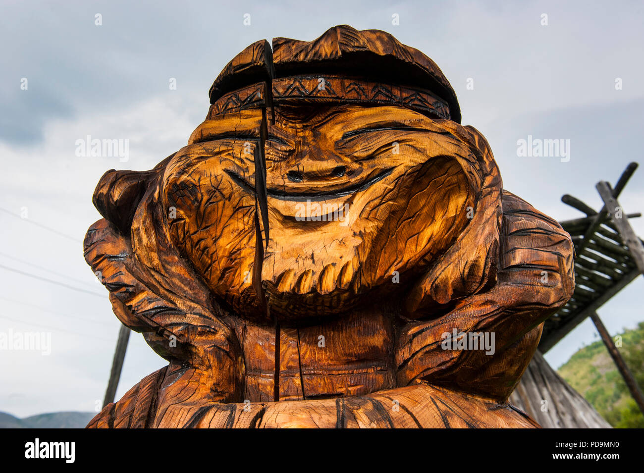 Head of wooden figure, traditional wood carving in the Ewenen Museum, Esso, Kamchatka, Russia Stock Photo