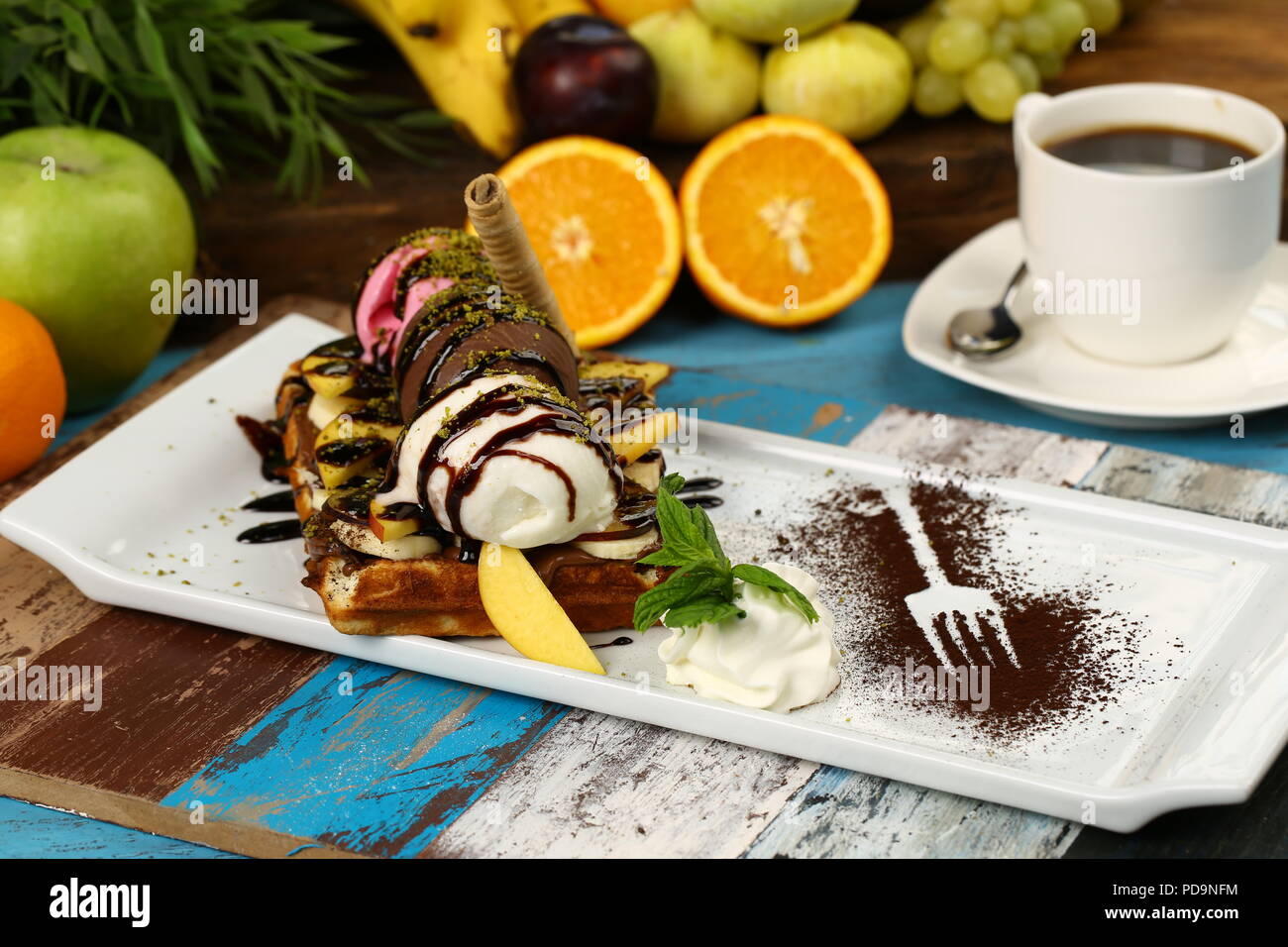 Waffle with chocolate sauce and banana, kiwi strawberry fruits Stock ...