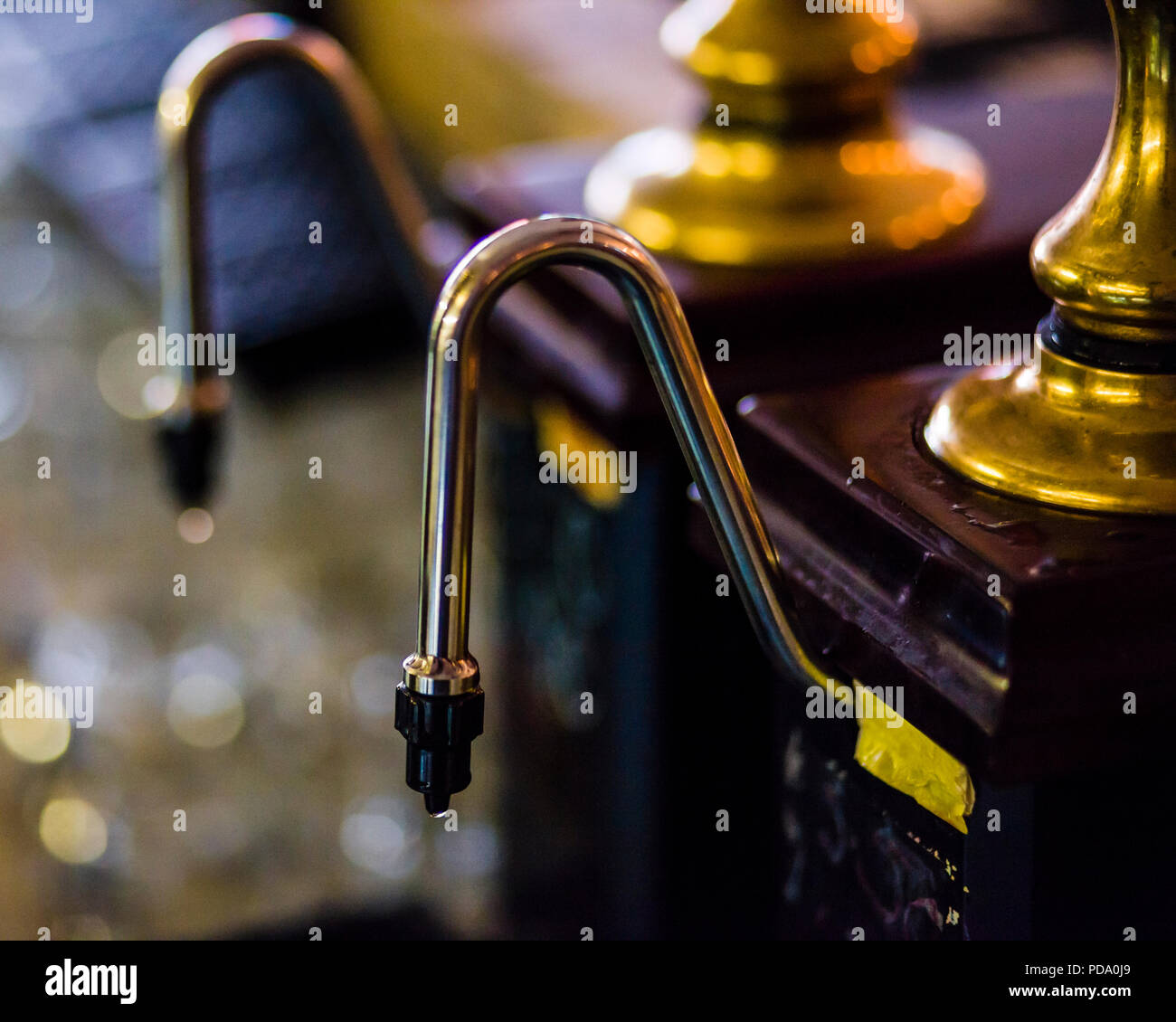 Pumps in a bar in Bradford, West Yorkshire, UK Stock Photo