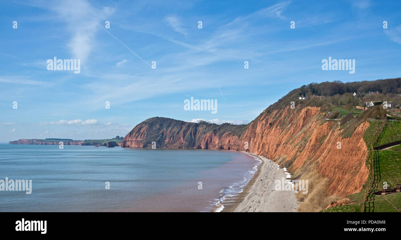 Scenic view along the Jurassic Coast of Lyme Bay looking eastwards from Sidmouth, Devon, England, UK on a sunny late winter/early spring day. Stock Photo