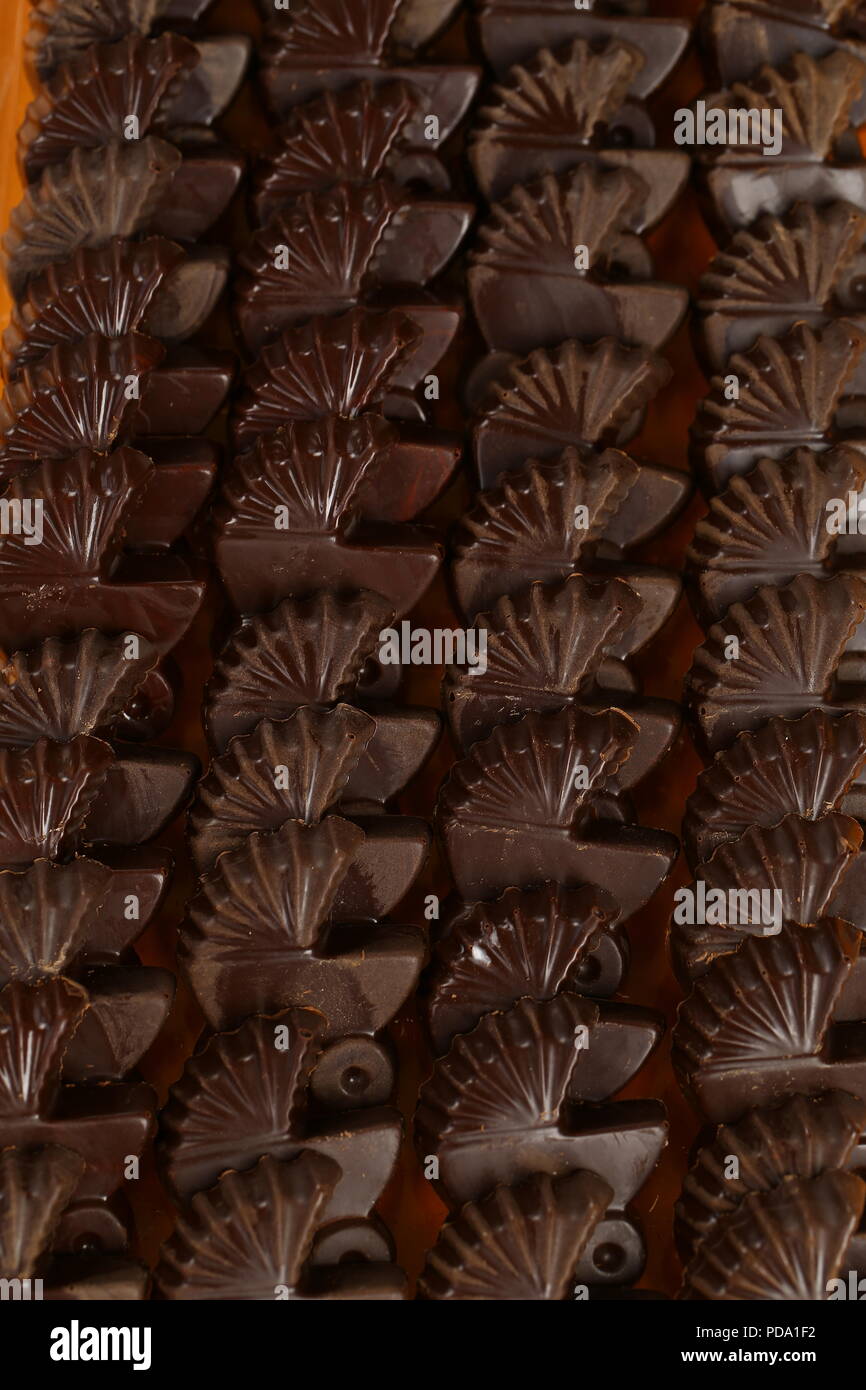 Chocolate bars, pralines and truffles of different kinds Stock Photo