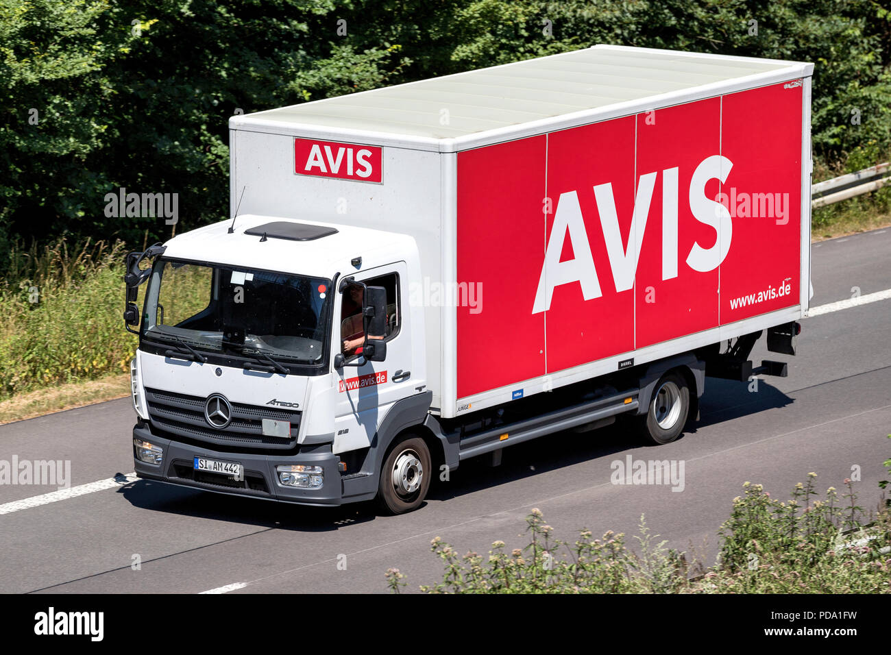 MercedesBenz Atego of Avis on motorway. Avis is an American car rental