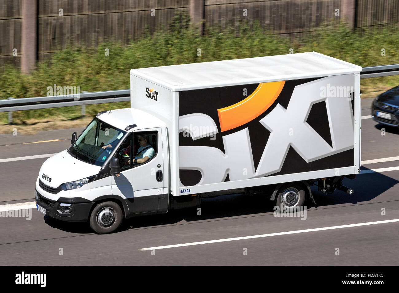 Iveco Daily of Sixt on motorway. Sixt SE is a European multinational car rental company with