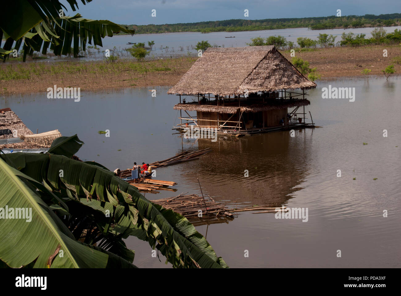 Traditional house on the Amazon river in Iquitos, Peru. Stock Photo