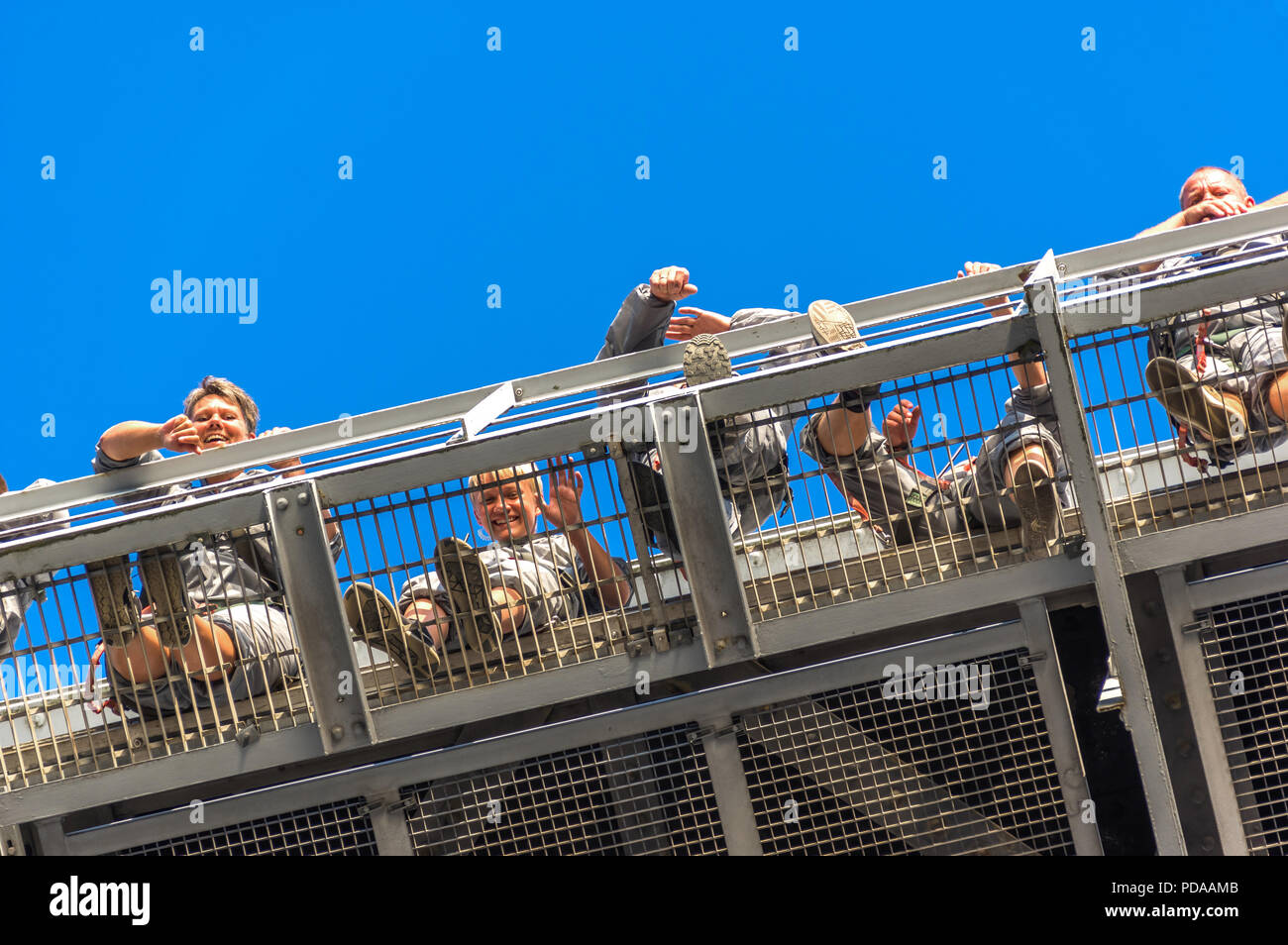 Denmark, Fredericia: Group of the bridgewalking fans walk above the old Little Belt Bridge. Stock Photo