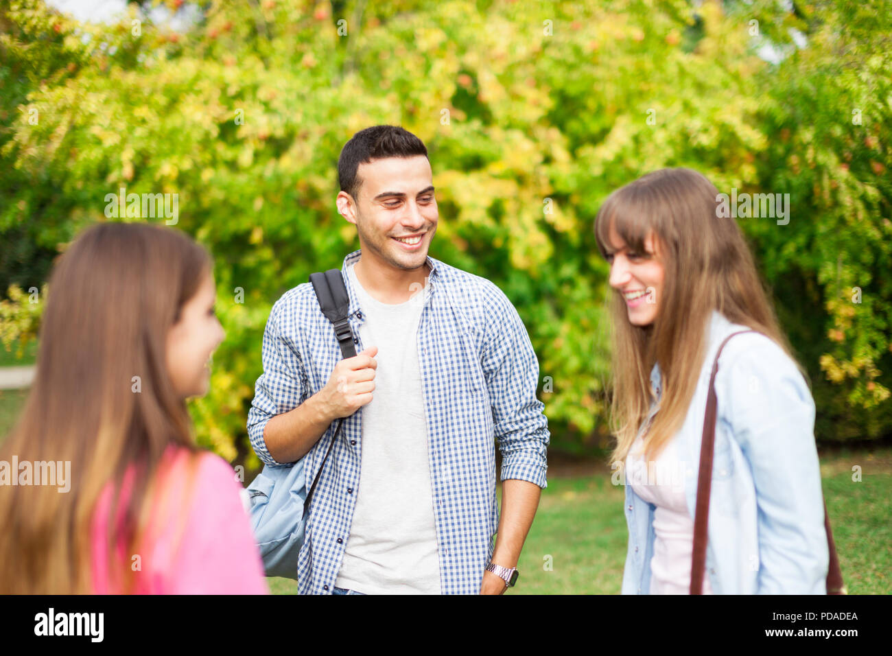 Outdoor portrait of a group of smiling students Stock Photo - Alamy