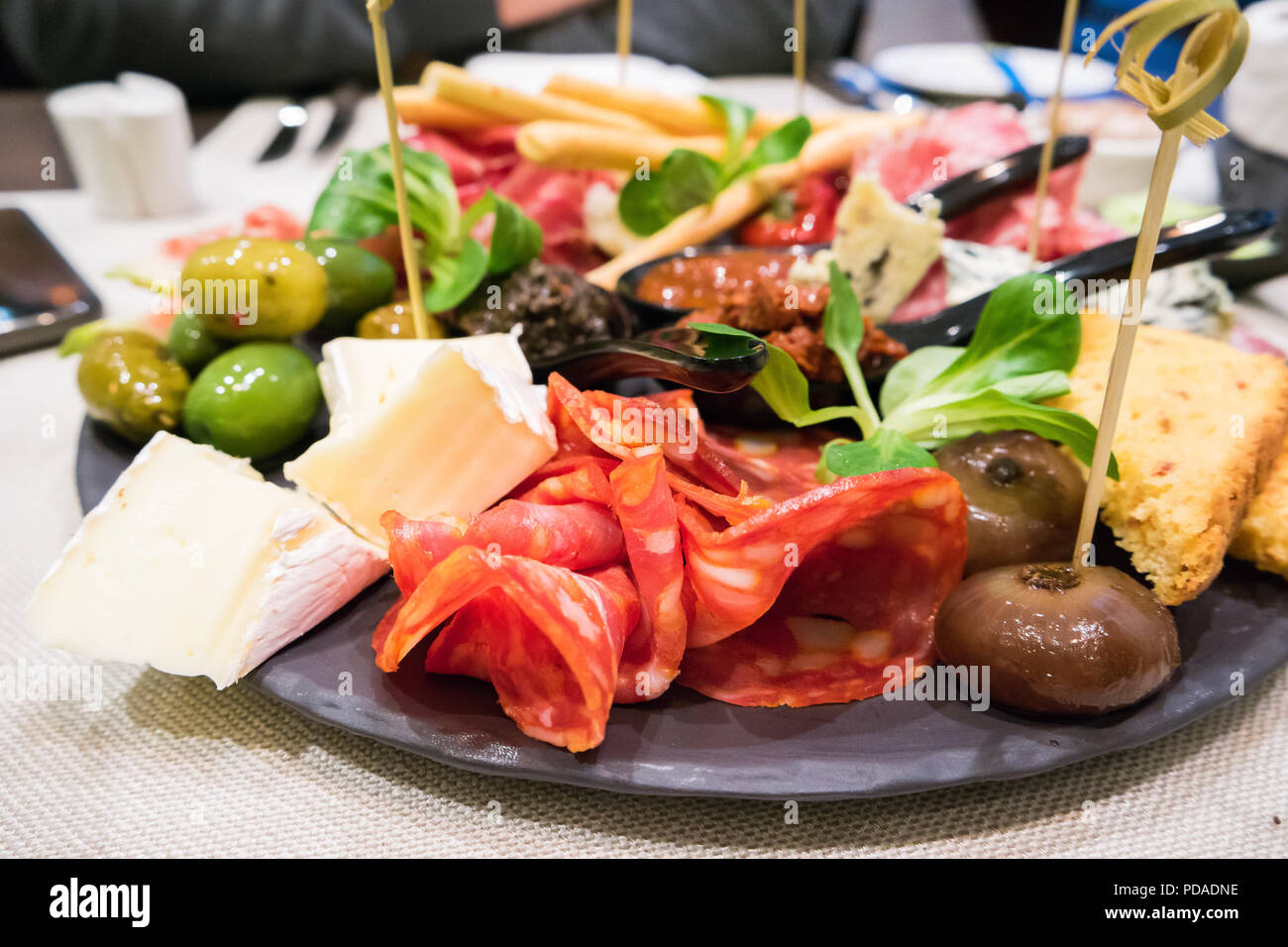 Plate full of italian starters Stock Photo Alamy