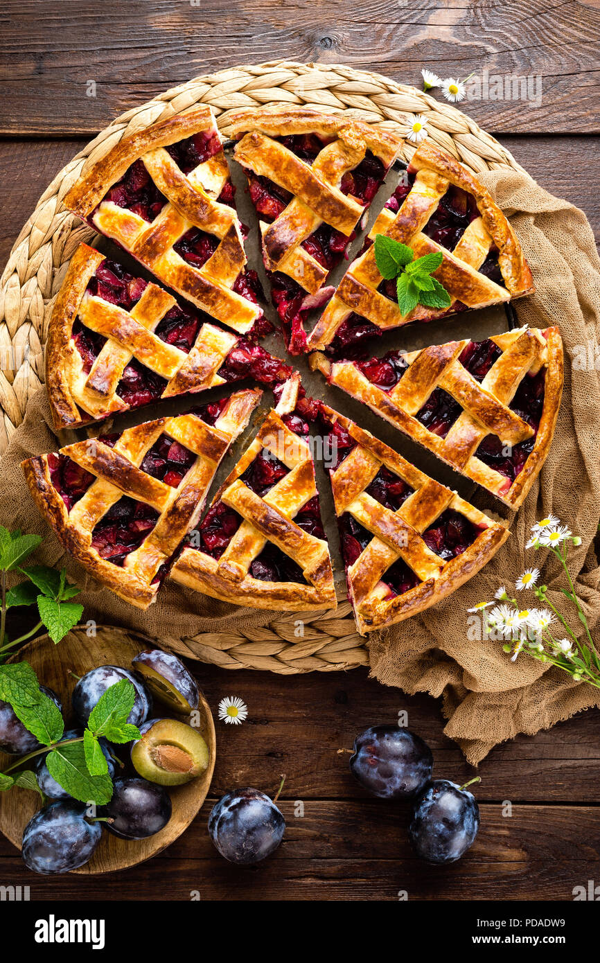 Fruit pie. Sweet pie, tart with fresh plums. Delicious cake with plums