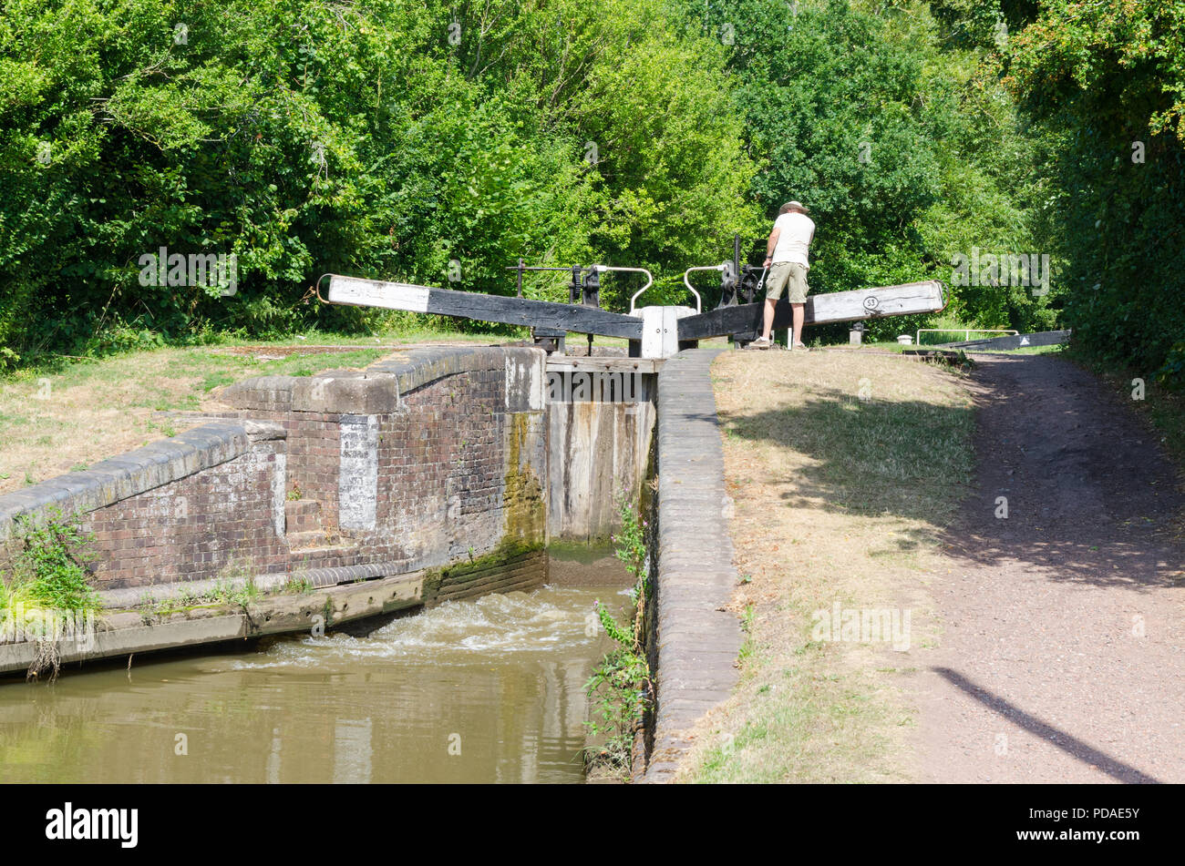 Narrowboat passing through one of the many locks on the Worcester and