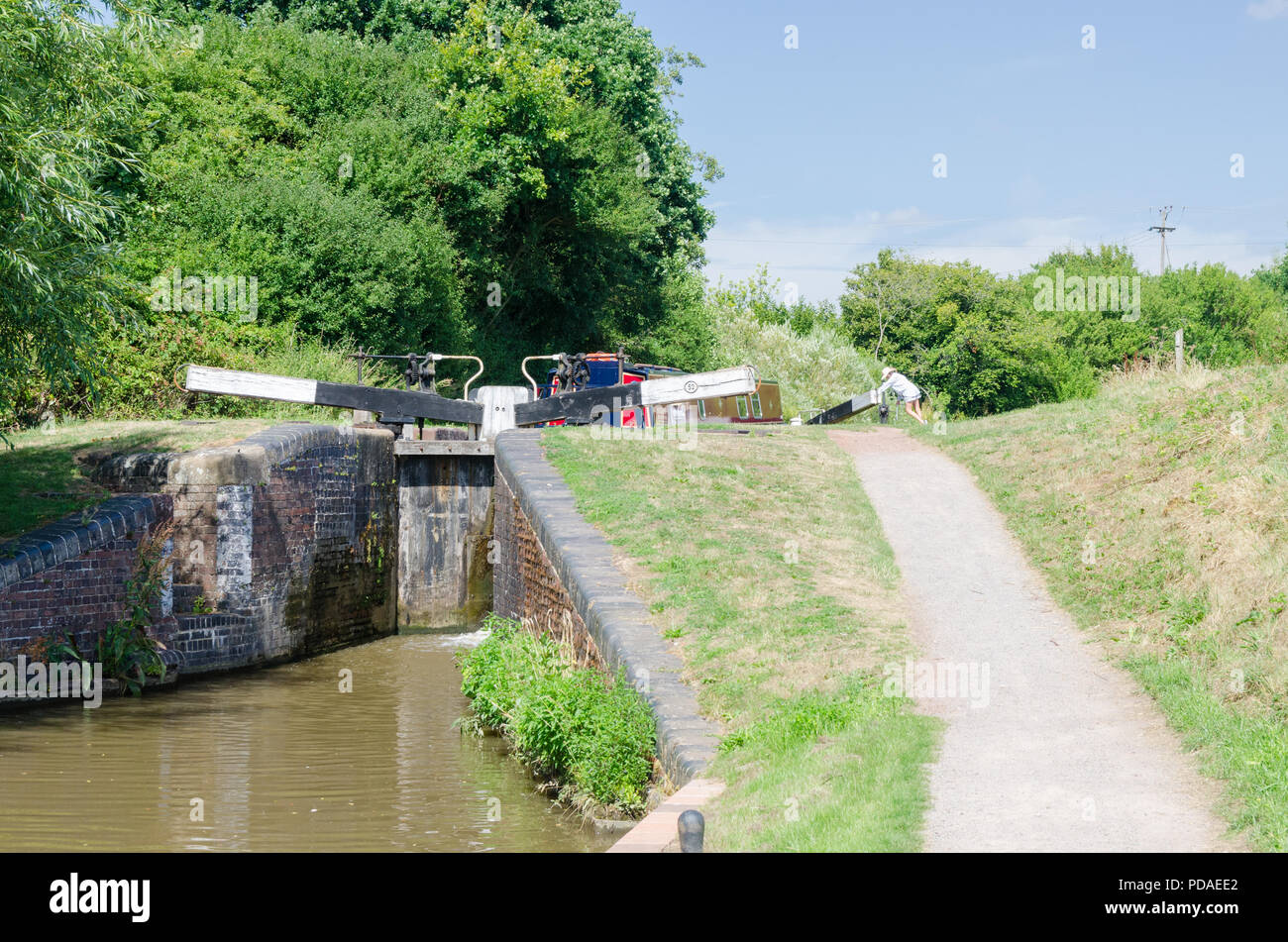 Narrowboat passing through one of the many locks on the Worcester and