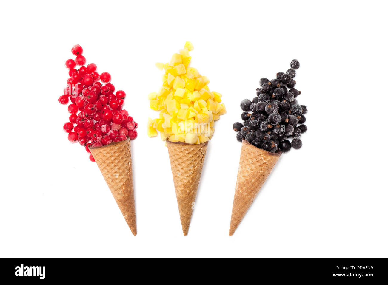 Various Of Ice Cream Flavor In Cones Frozen Berries Mango Pineapple Red And Black Currant On White Background Summer Creative Concept Stock Photo Alamy