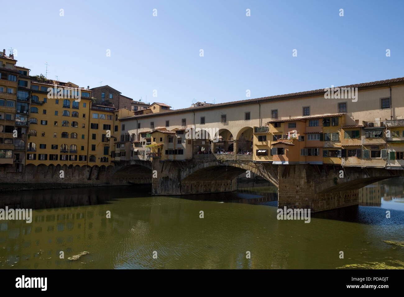 The iconic Ponte Vecchio spanning the River Arno in Florence Tuscany, Italy Stock Photo