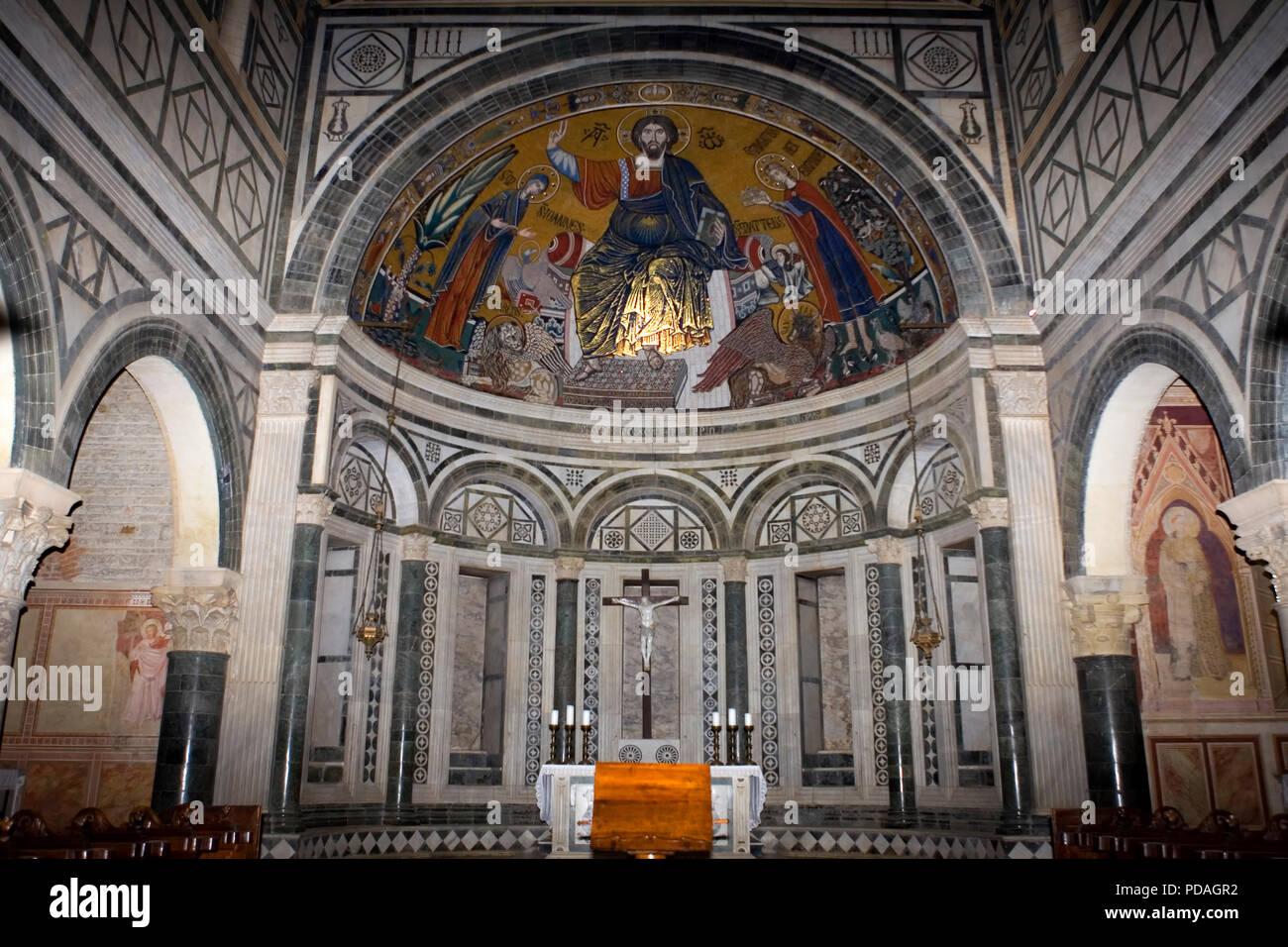 The apse, with its famous mosaic (1260) of Christ between the Virgin and St Minias, San Miniato al Monte, Florence Stock Photo