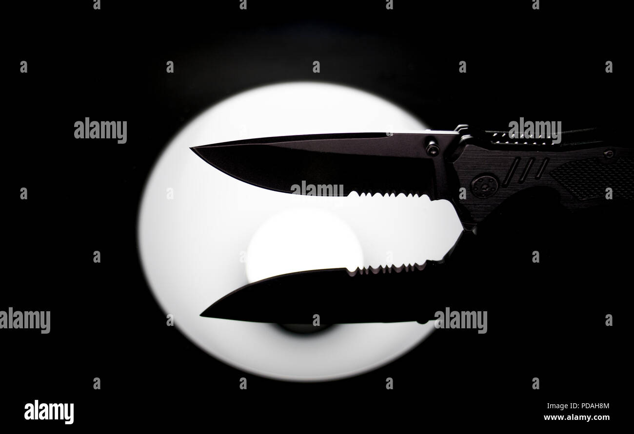 Concealed blade hi-res stock photography and images - Alamy