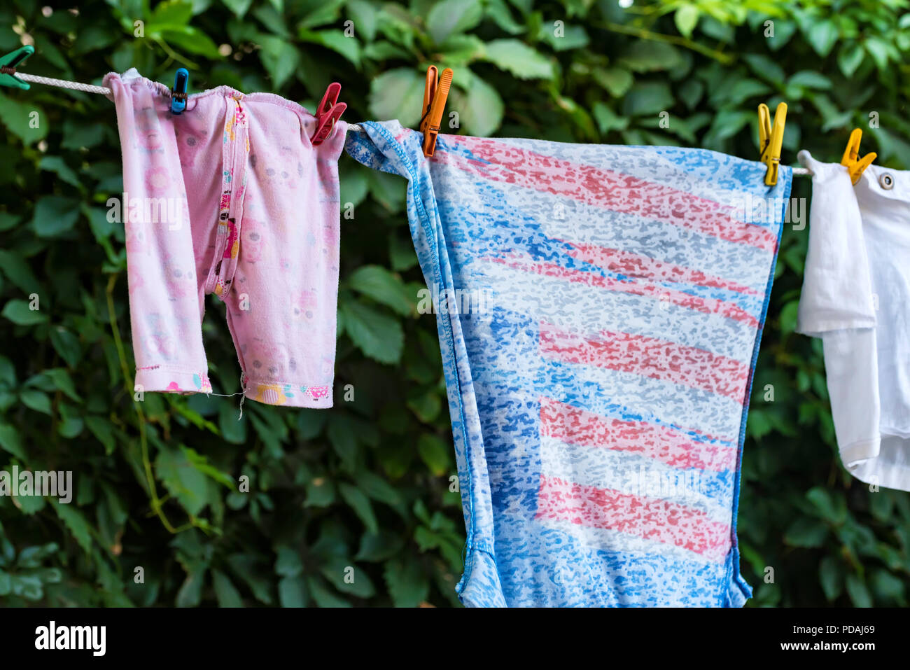 Baby clothes line hires stock photography and images Alamy