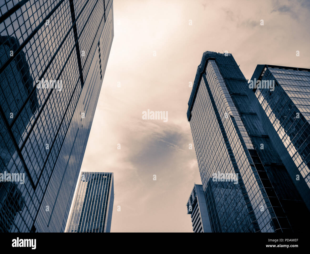 Bottom up view of Modern office building in Hong Kong Stock Photo - Alamy