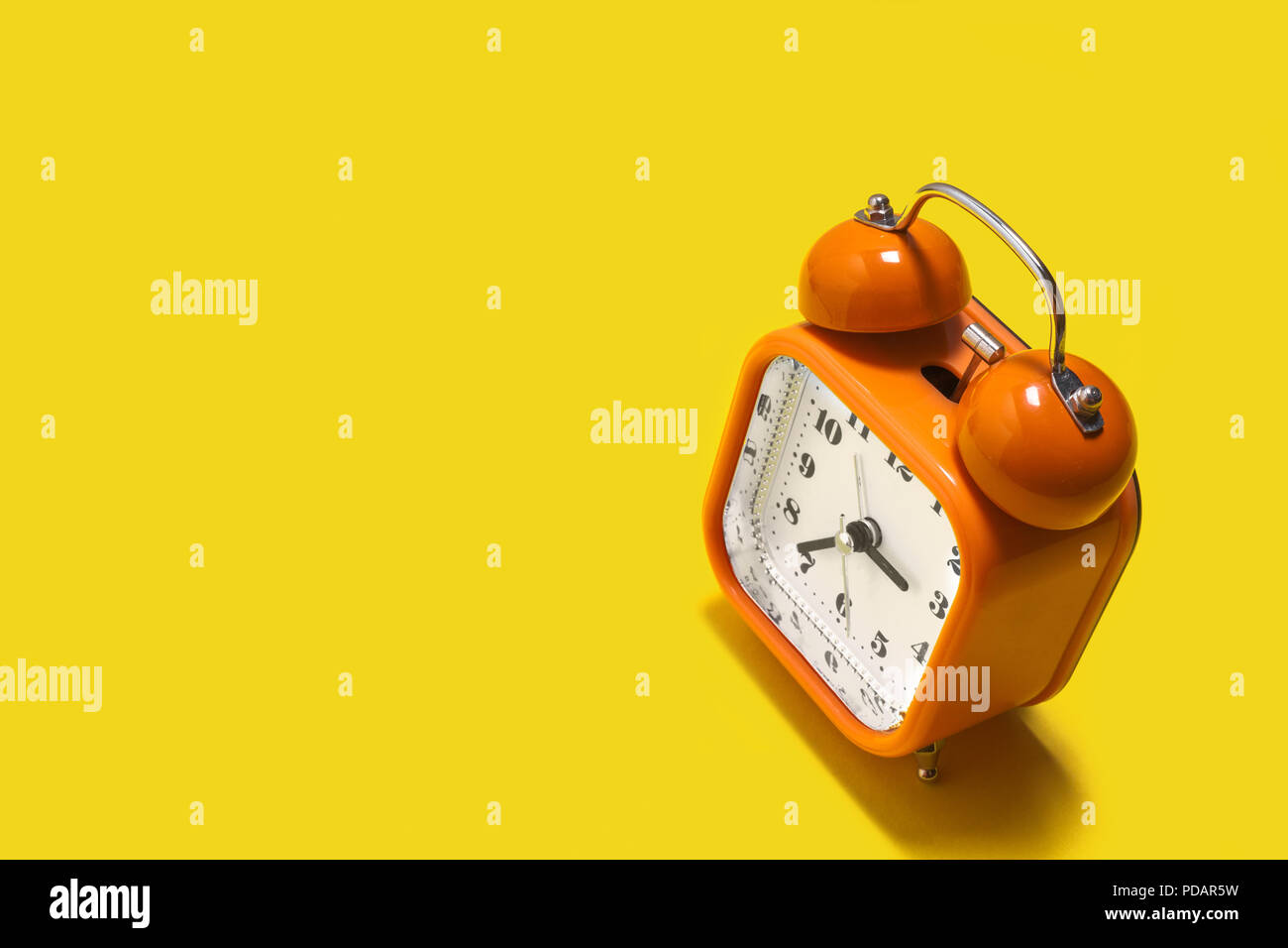orange alarm clock Stock Photo Alamy