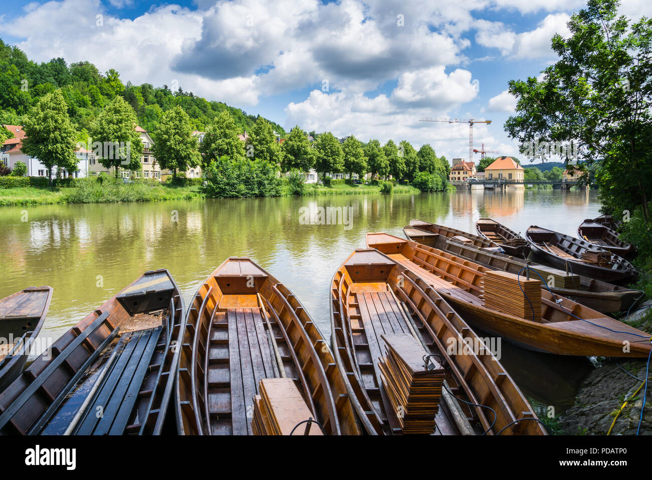 Germany, Many traditional wooden punt boats on Neckar river in Tuebingen City Stock Photo