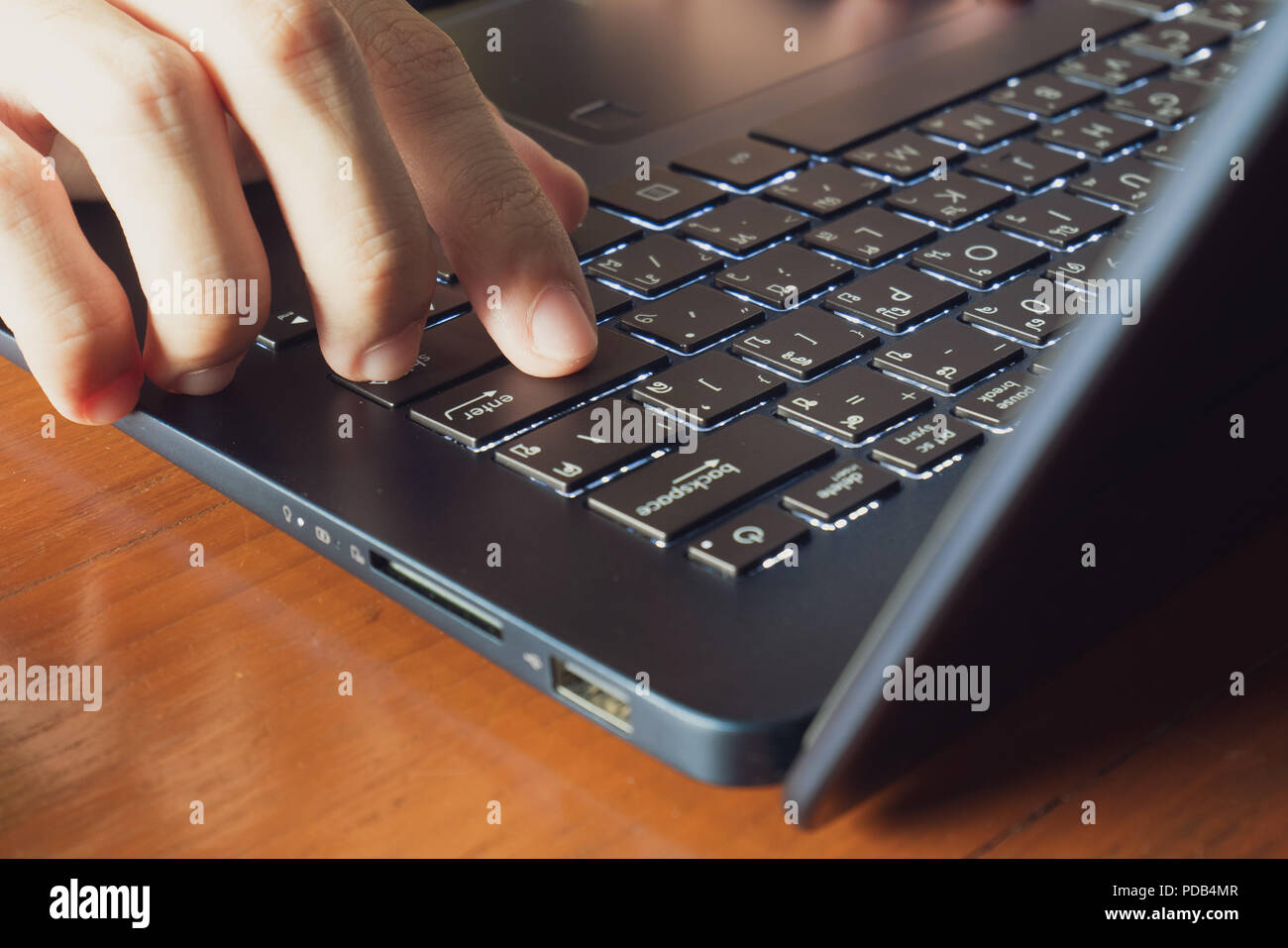 man using laptop Stock Photo