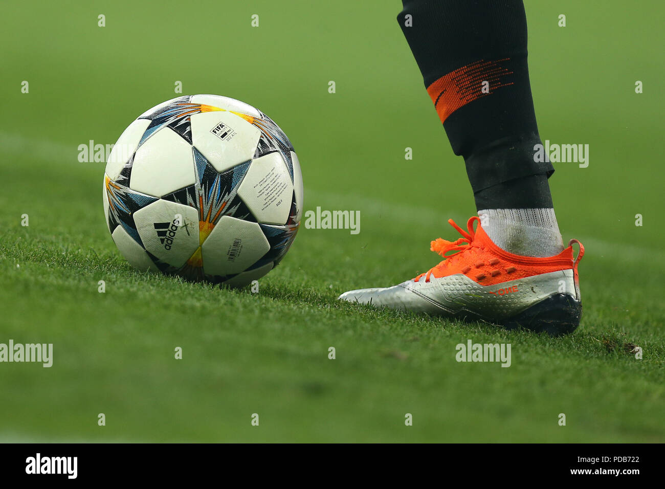 3 AUGUST, 2018 - KIEV, UKRAINE: Official match ball of UEFA Champions  League dribbled by player with Puma silver boots isolated on the green  pitch Stock Photo - Alamy