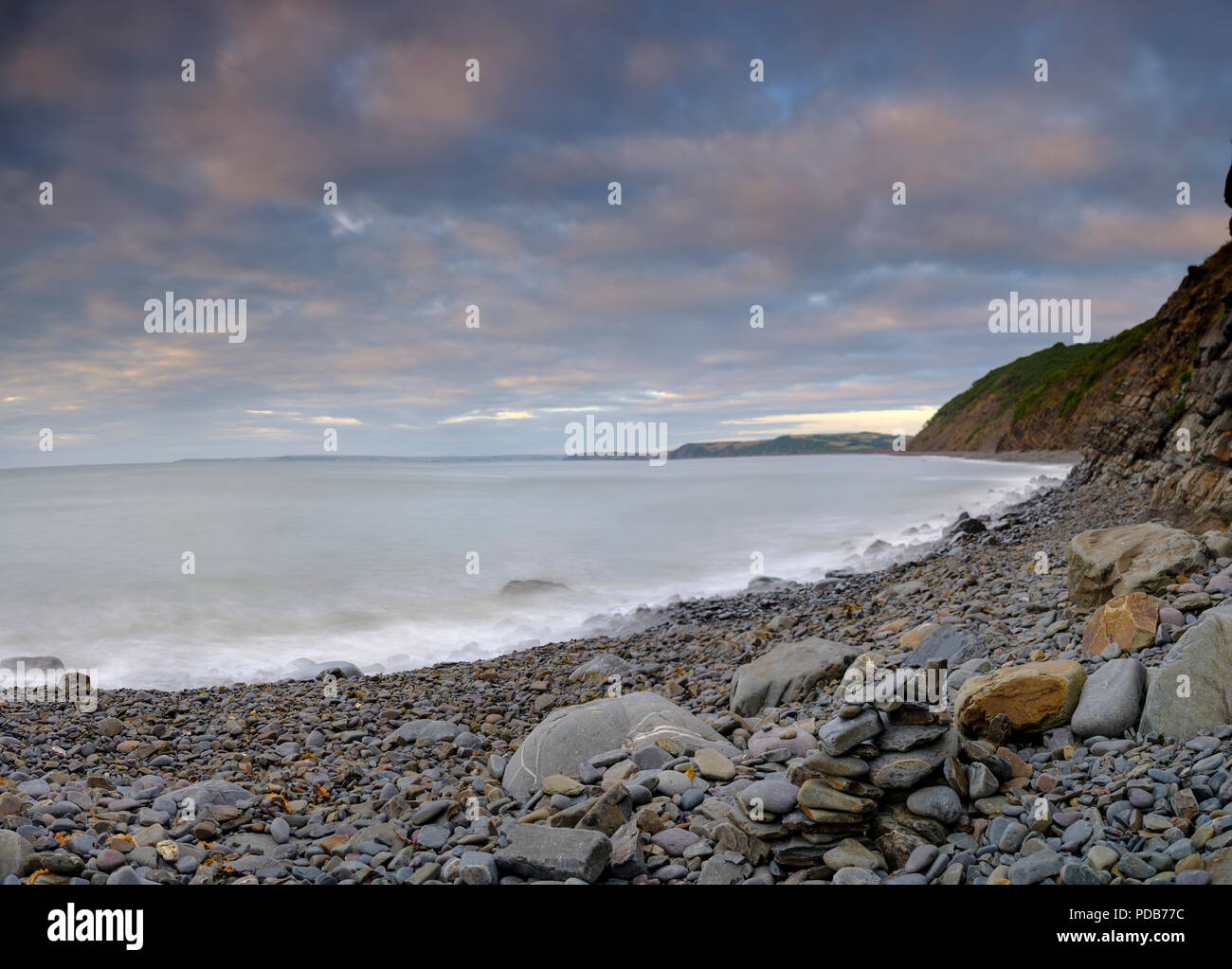 Summer sunset on the beach at Buck's Mill on the North Devon Coast, UK Stock Photo