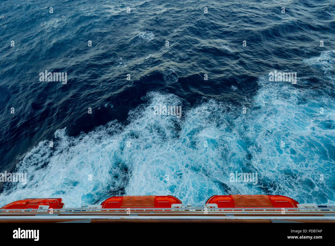 Lifeboats and Seaspray on Carnival Freedom Cruise Ship Stock Photo