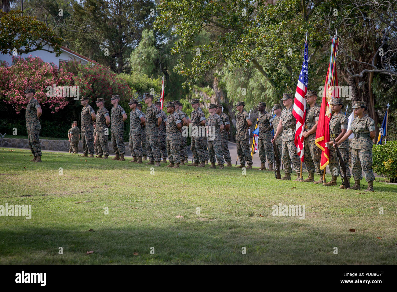 U.S. Marines with Marine Corps Air Station Camp Pendleton (MCAS) stand at parade rest during the MCAS Camp Pendleton change of command ceremony at the Santa Margarita Ranch House, Marine Corps Base Camp Pendleton, California, August 2, 2018. The ceremony formally marked the transfer of authority and responsibility of MCAS Camp Pendleton to Col. Richard T. Anderson, incoming commanding officer, MCAS Camp Pendleton. (U.S. Marine Corps photo by Lance Cpl. Betzabeth Y. Galvan) Stock Photo