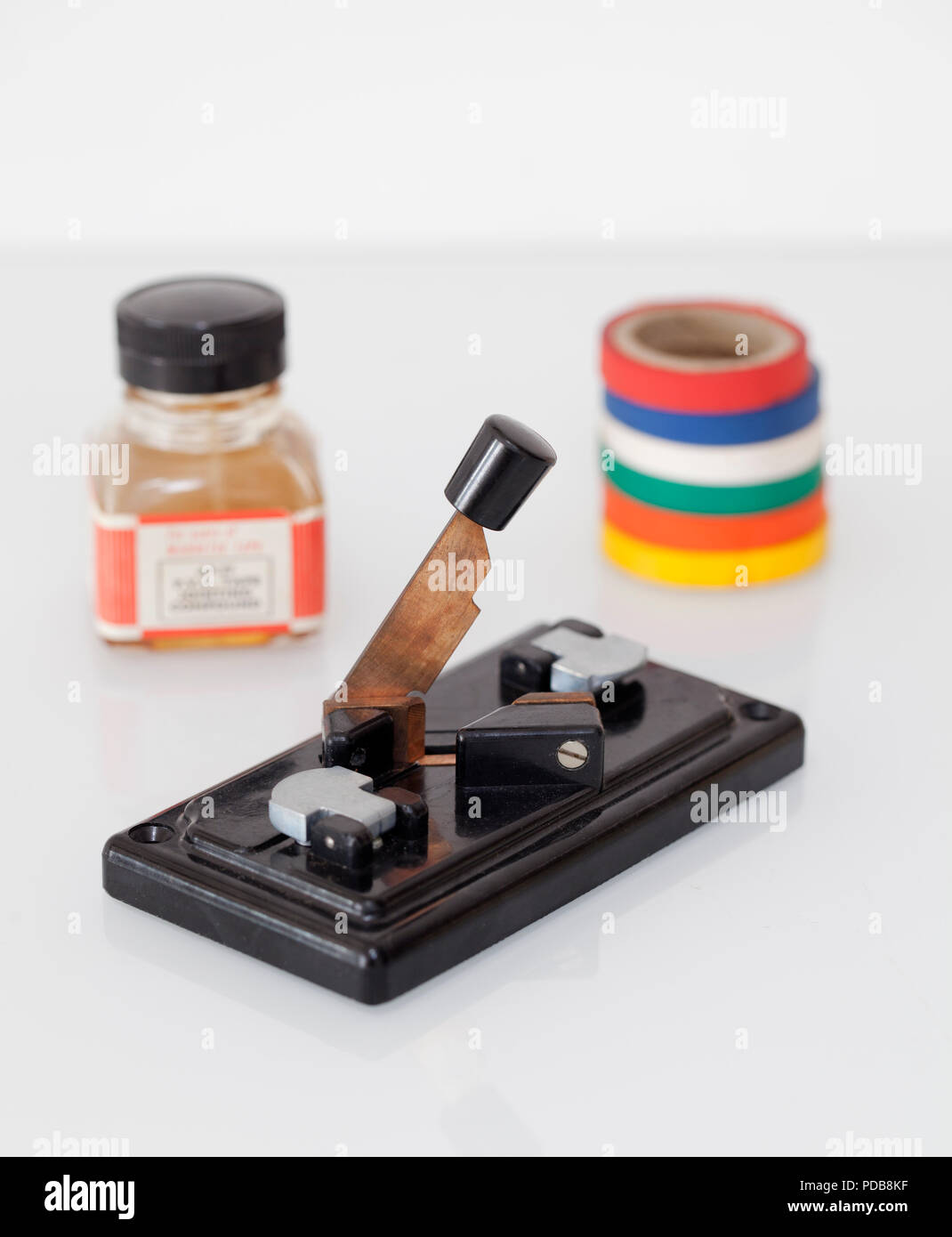 Old Vintage Bakelite Sound Editing Kit with Tape and Adhesive Stock Photo
