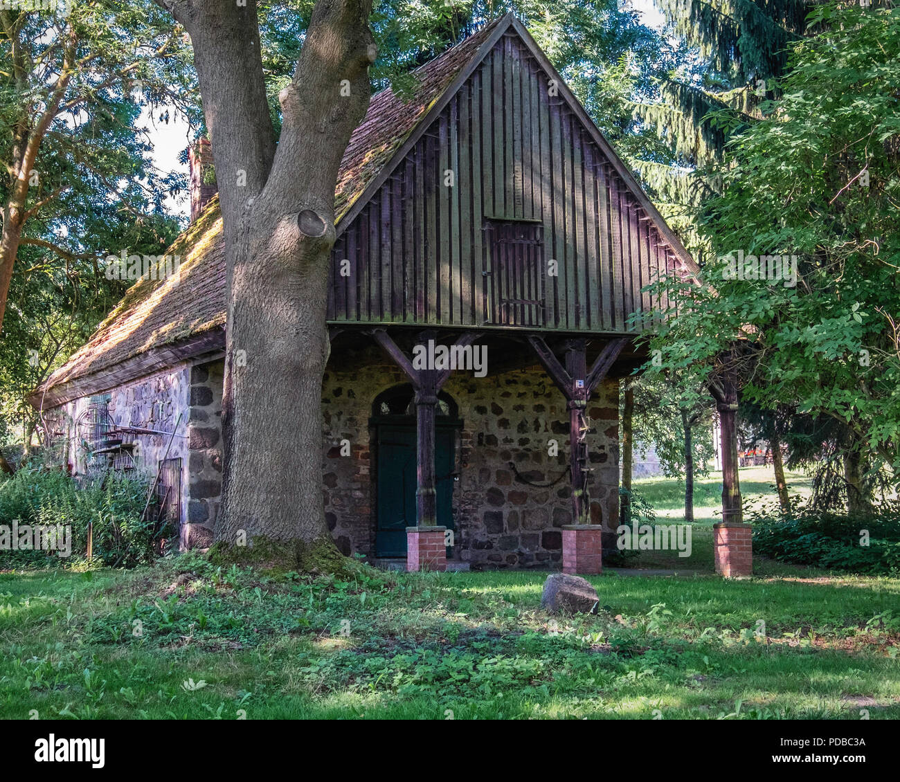 Germany,Stolpe an der Peene, Historic old blacksmith on Gutshaus Stolpe Estate grounds Listed stone building Stock Photo