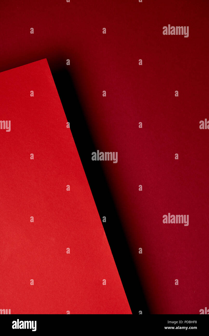 Pattern of overlapping red paper sheets Stock Photo - Alamy