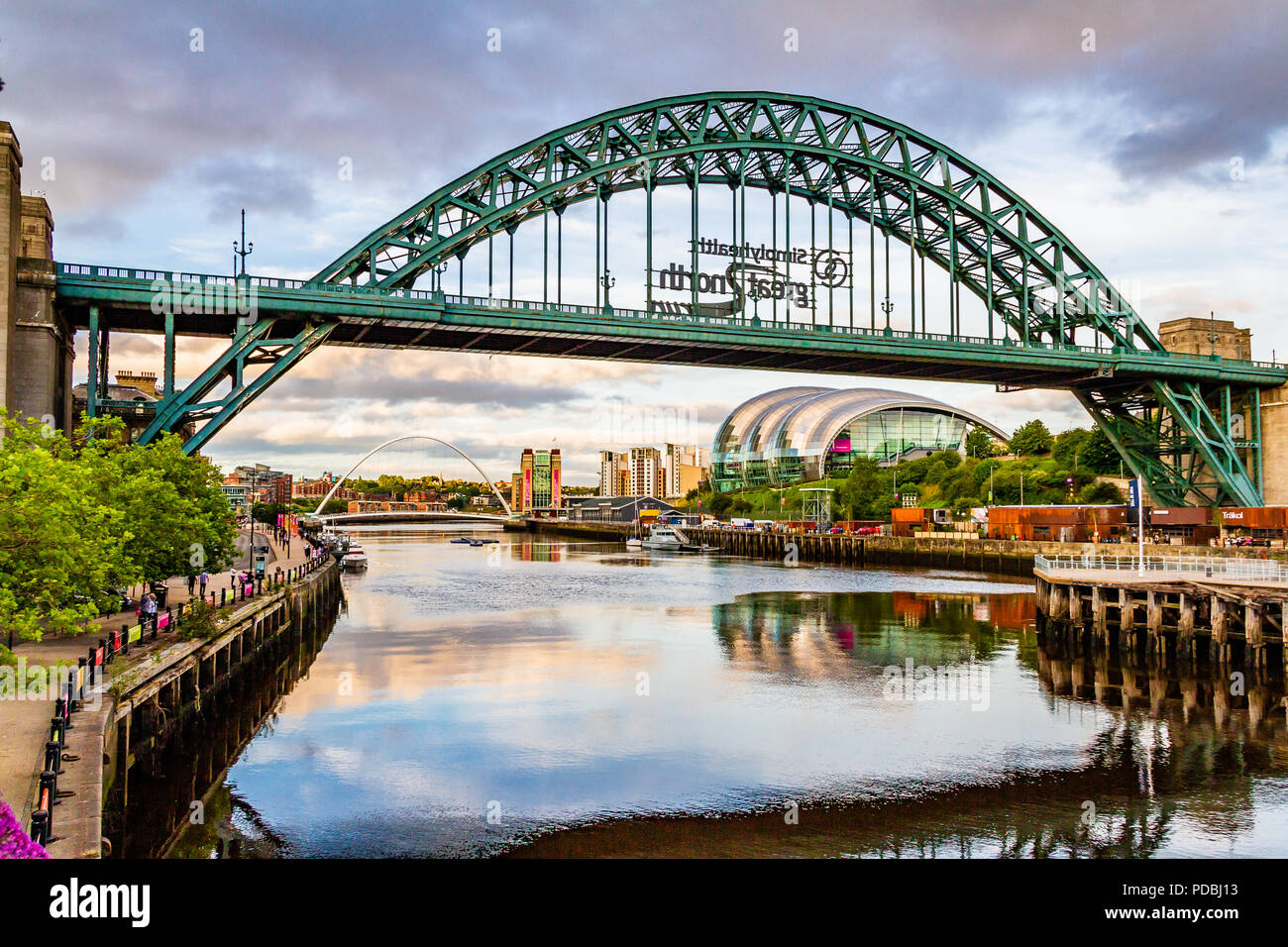 The Tyne riverside with the Tyne Bridge, Millennium Bridge, Sage and Baltic Art Gallery at sunset, Newcastle-upon-Tyne and Gateshead, UK. Stock Photo