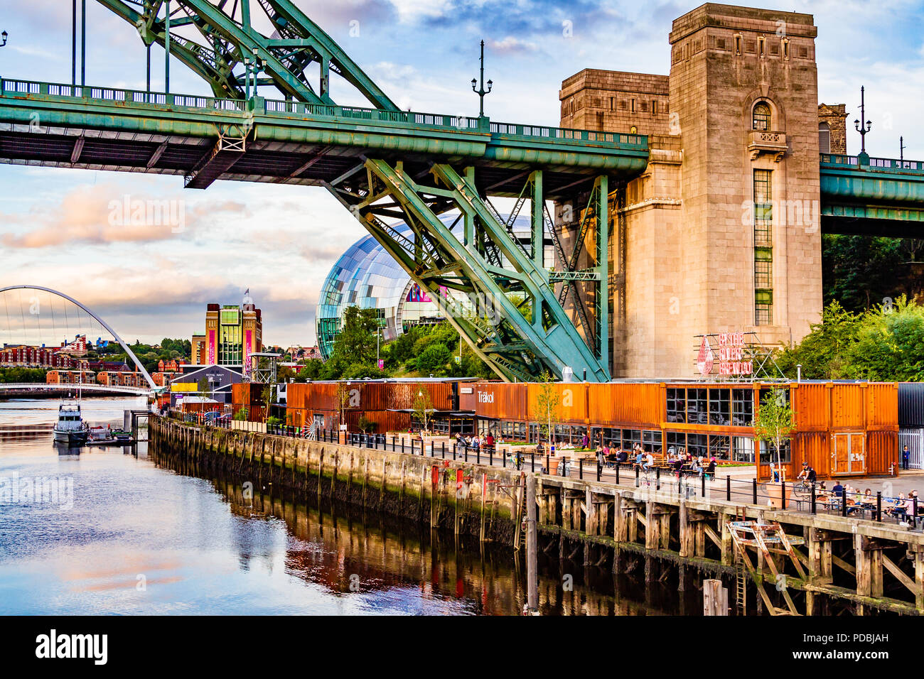 Riverside Brew Co bar and restaurant in reused shipping containers on the Tyne riverside under the Tyne Bridge, helping to regenerate Gateshead. 2018. Stock Photo
