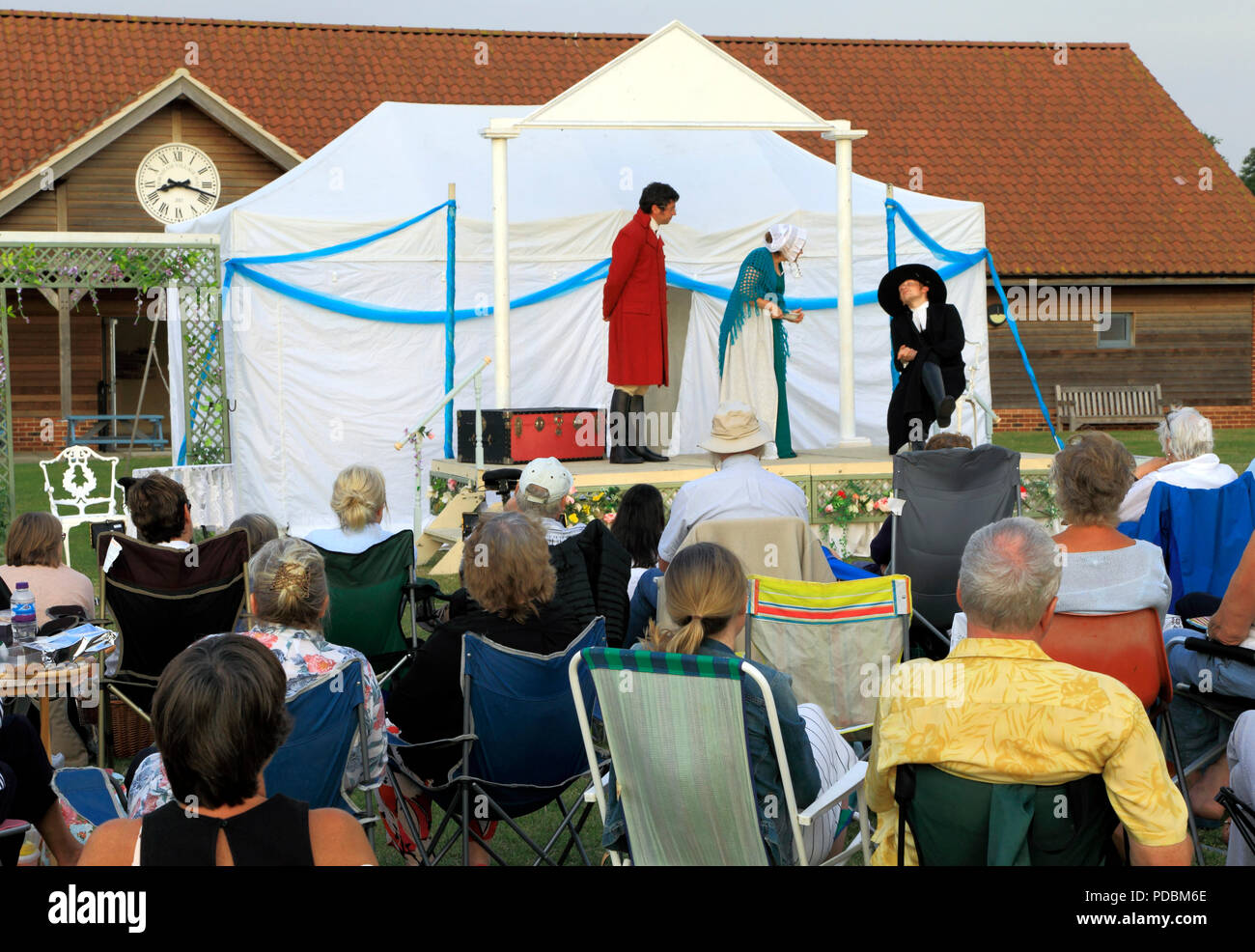 Open air Theatre, Heartbreak Productions, Pride and Prejudice, audience, outdoor, stage,Thornham, Norfolk, UK Stock Photo
