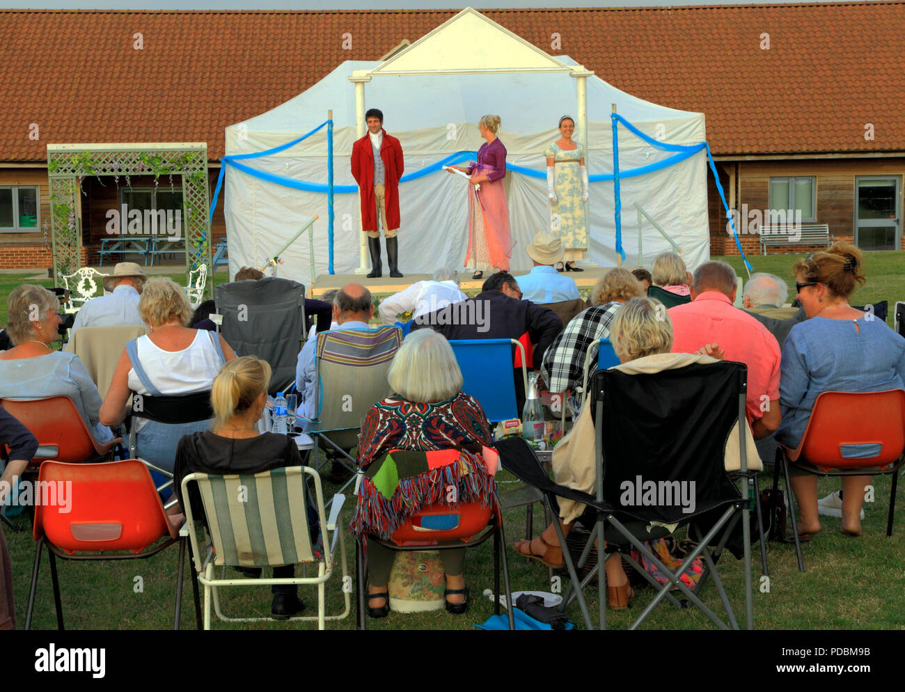 Open air Theatre, Heartbreak Productions, Pride and Prejudice, audience, outdoor, stage,Thornham, Norfolk, UK Stock Photo
