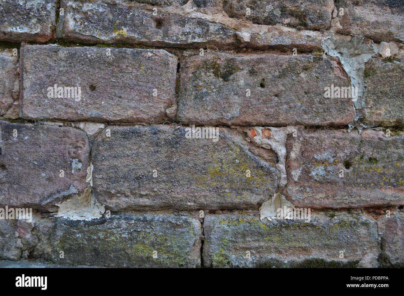 texture of an old sandstone wall in wallpaper format shot in Germany Stock Photo