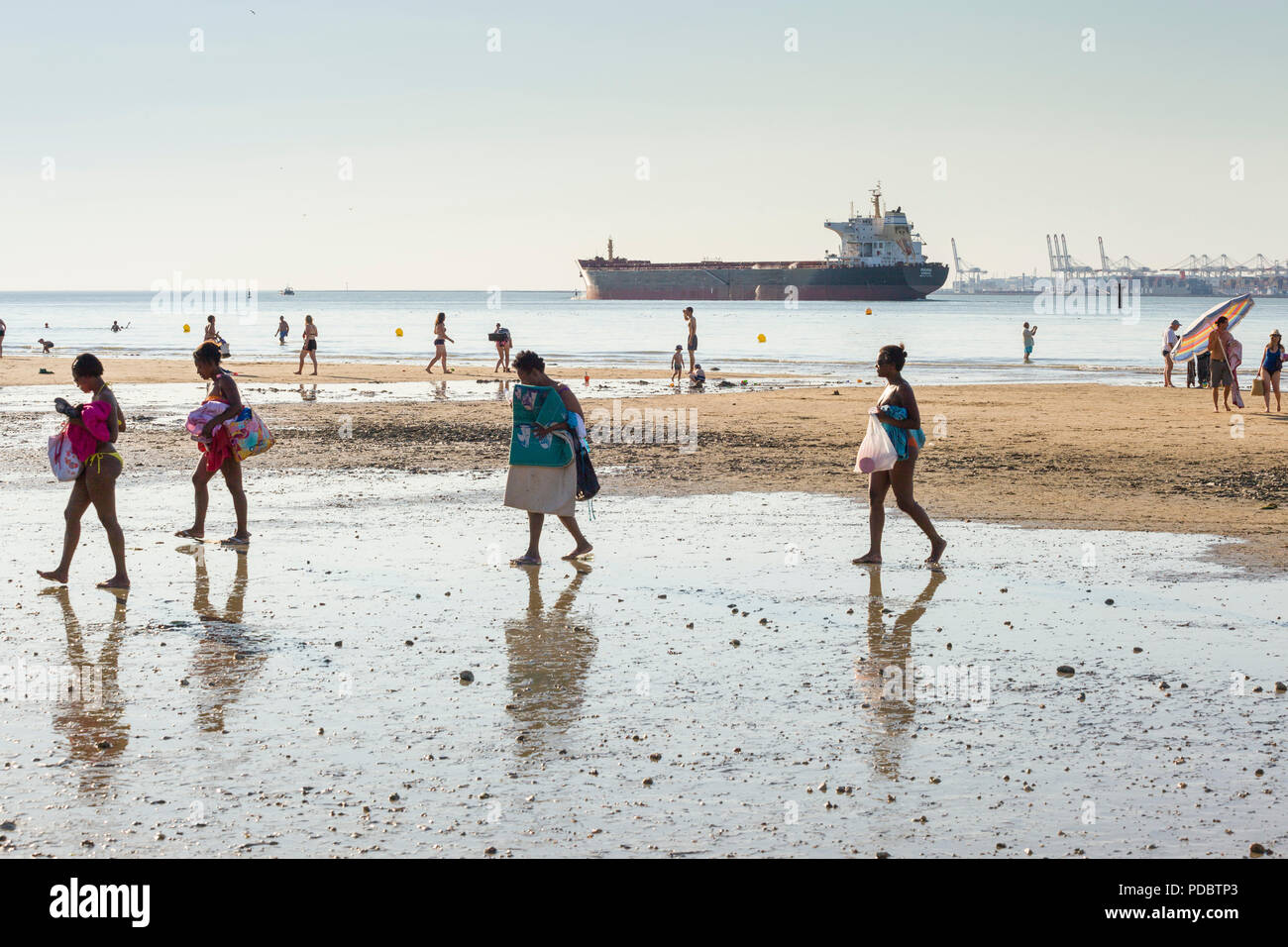 Holidaymakers Walk Along The Beach The Plage Du Butin At
