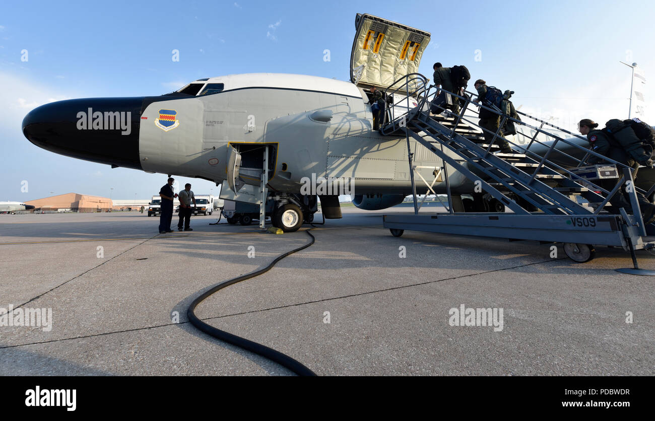 Crewmembers board an Offuttbased RC135V/W Rivet Joint Aug. 5, 2018
