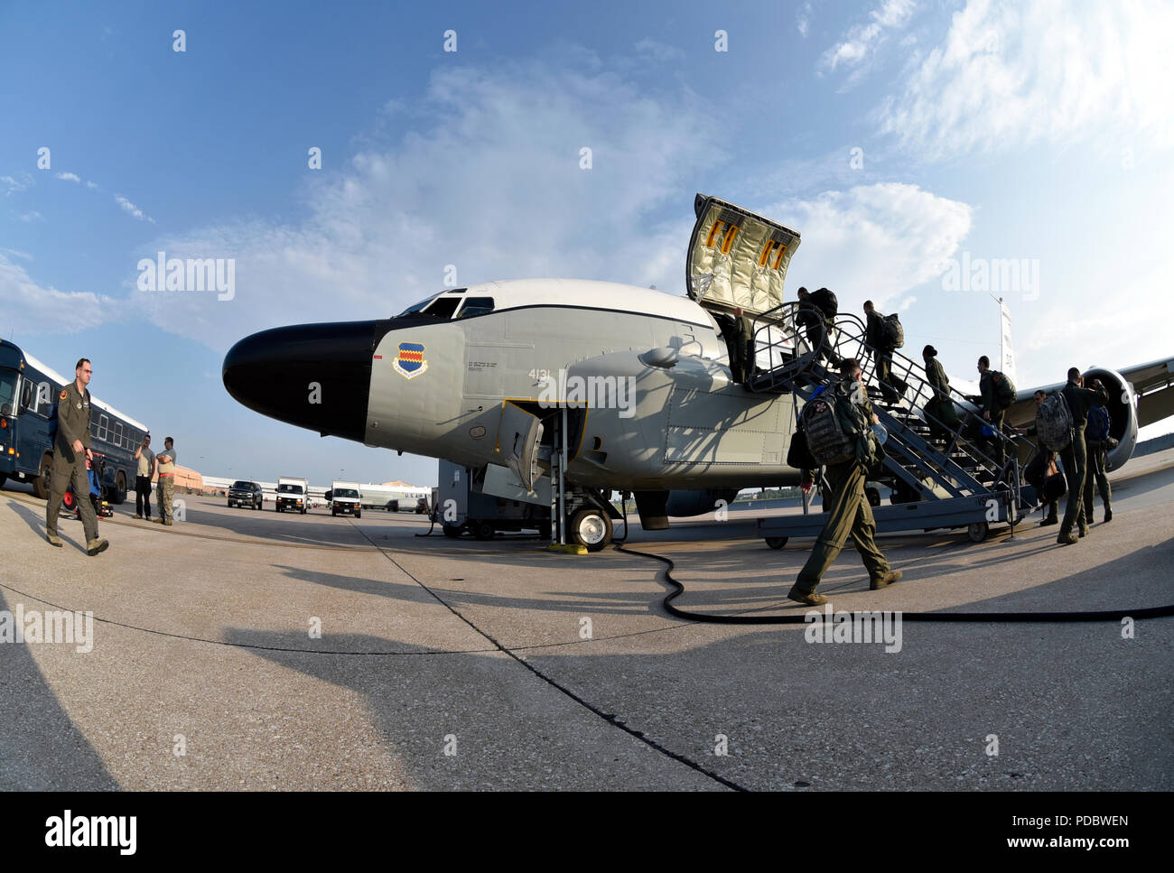 Crewmembers board an Offuttbased RC135V/W Rivet Joint Aug. 5, 2018