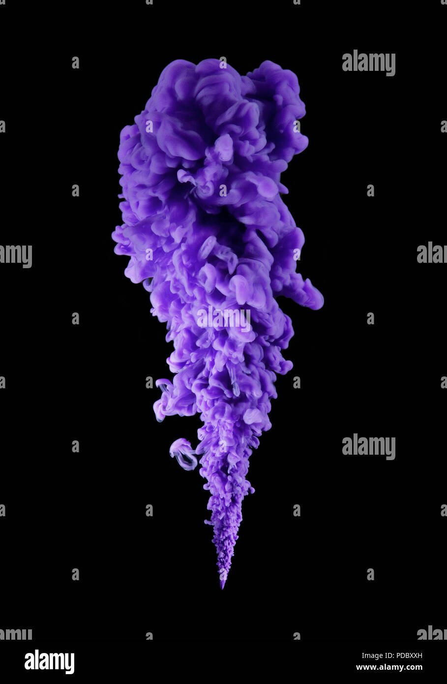 Purple ink on black background Stock Photo