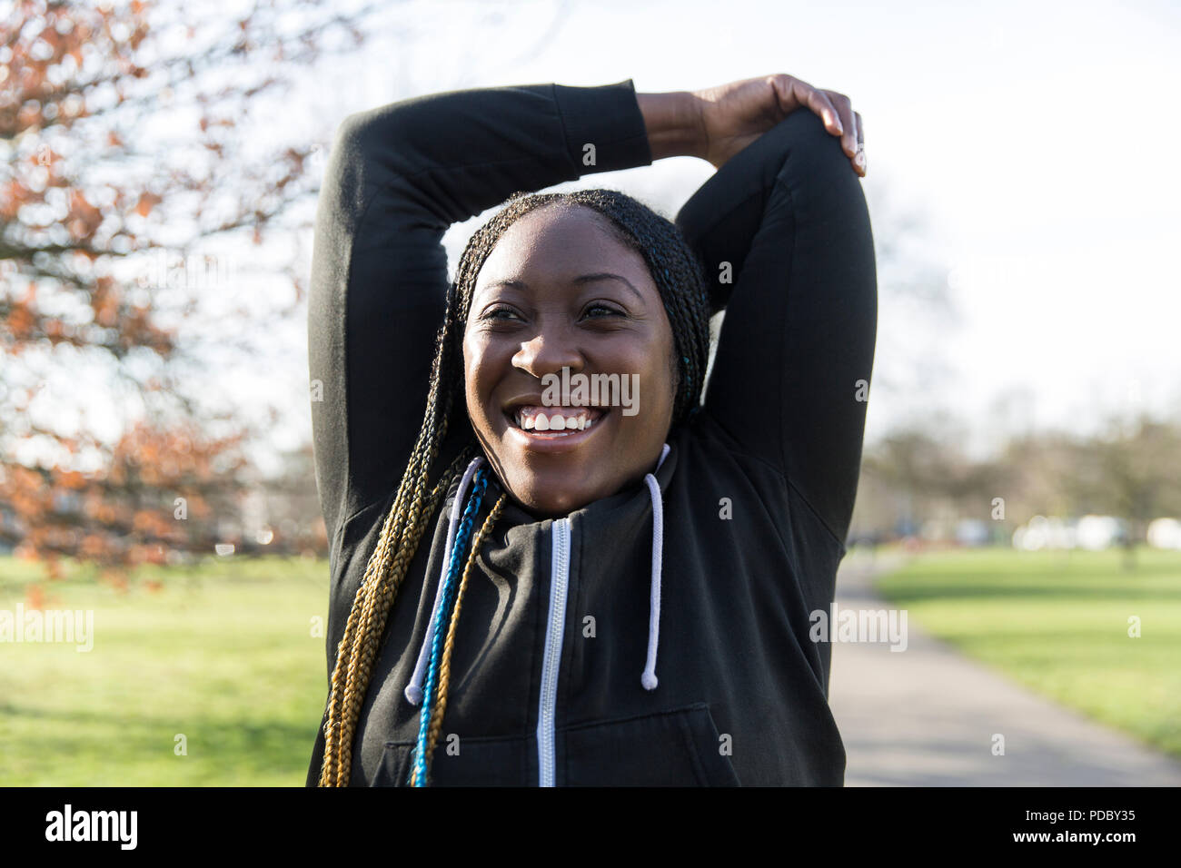 Stretching woman fitness runner hi-res stock photography and images - Alamy
