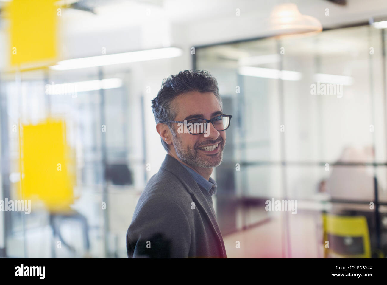 Portrait smiling, confident creative businessman in office Stock Photo