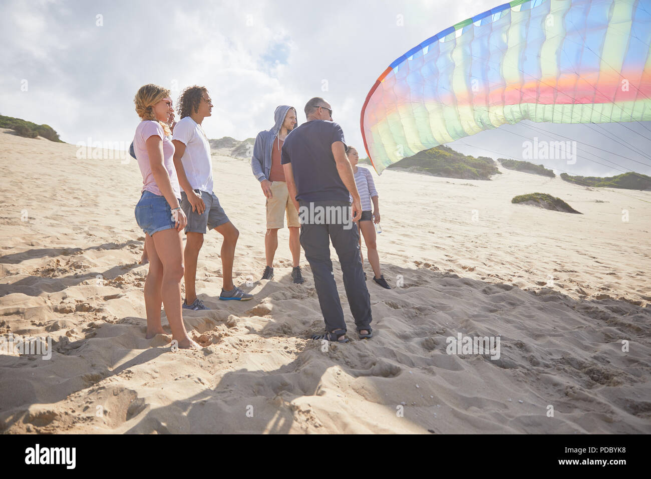 Man watching woman on beach hi-res stock photography and images - Alamy