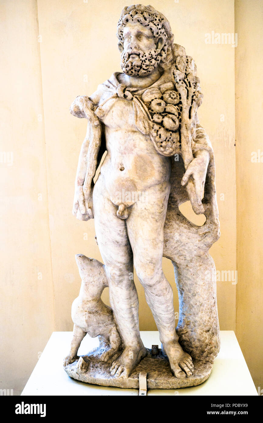 The god of the woods, covered by a faun-skin -nebris- is portrayed with pomegranates and bunches of grapes, while holding an oak branch, instead of his usual sacred pine branch, and a pedum of shepherd's staff, rather than his usual sickle. 160-190 AD - National Roman Museum - The Baths of Diocletian - Rome, Italy Stock Photo