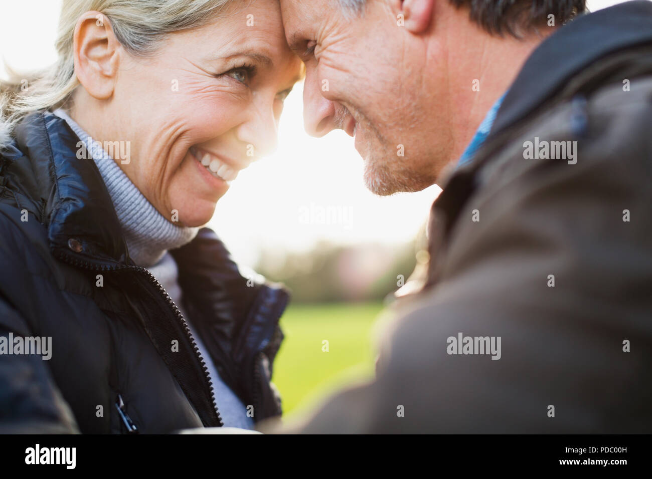 Close up affectionate, carefree mature couple head to head Stock Photo