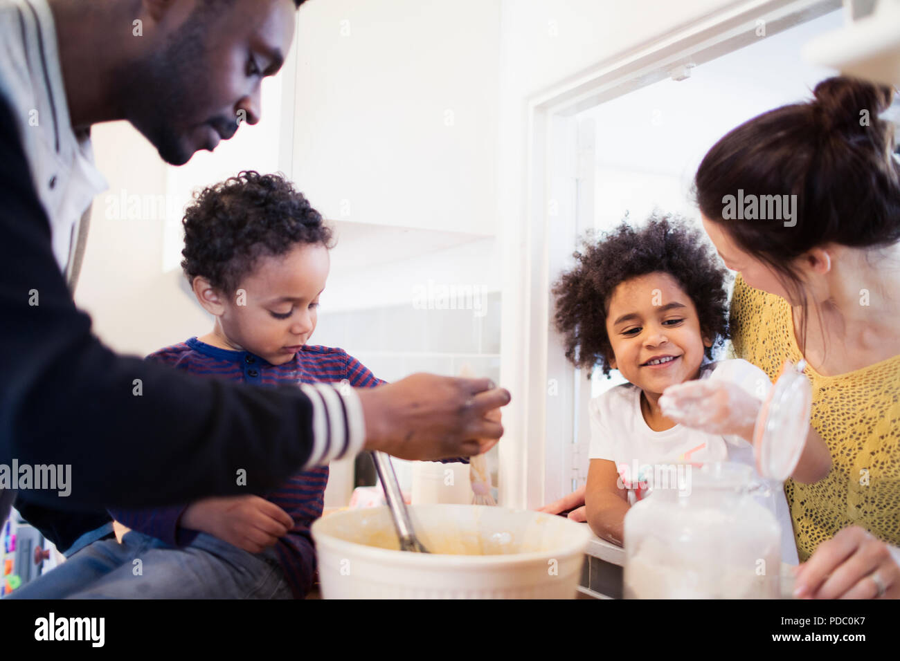 Family baking in kitchen Stock Photo