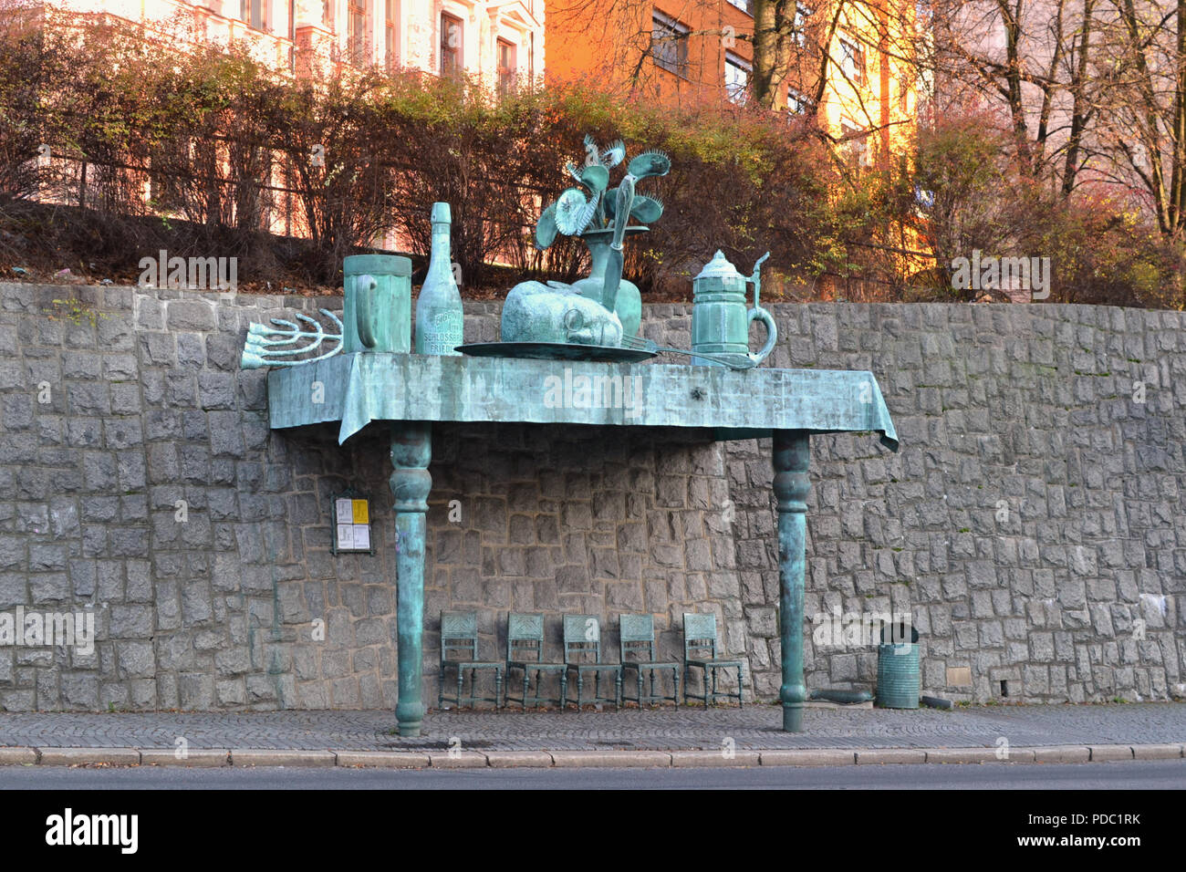 Empty bus stop in Liberec, Czech Republic, a work of art designed by David Cerný titled Hostina Obrů ("The Giant's Banquet" or "The Giant's Feast"). Stock Photo